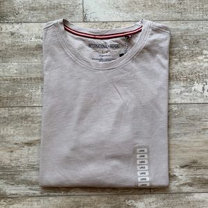 International Report crew tee